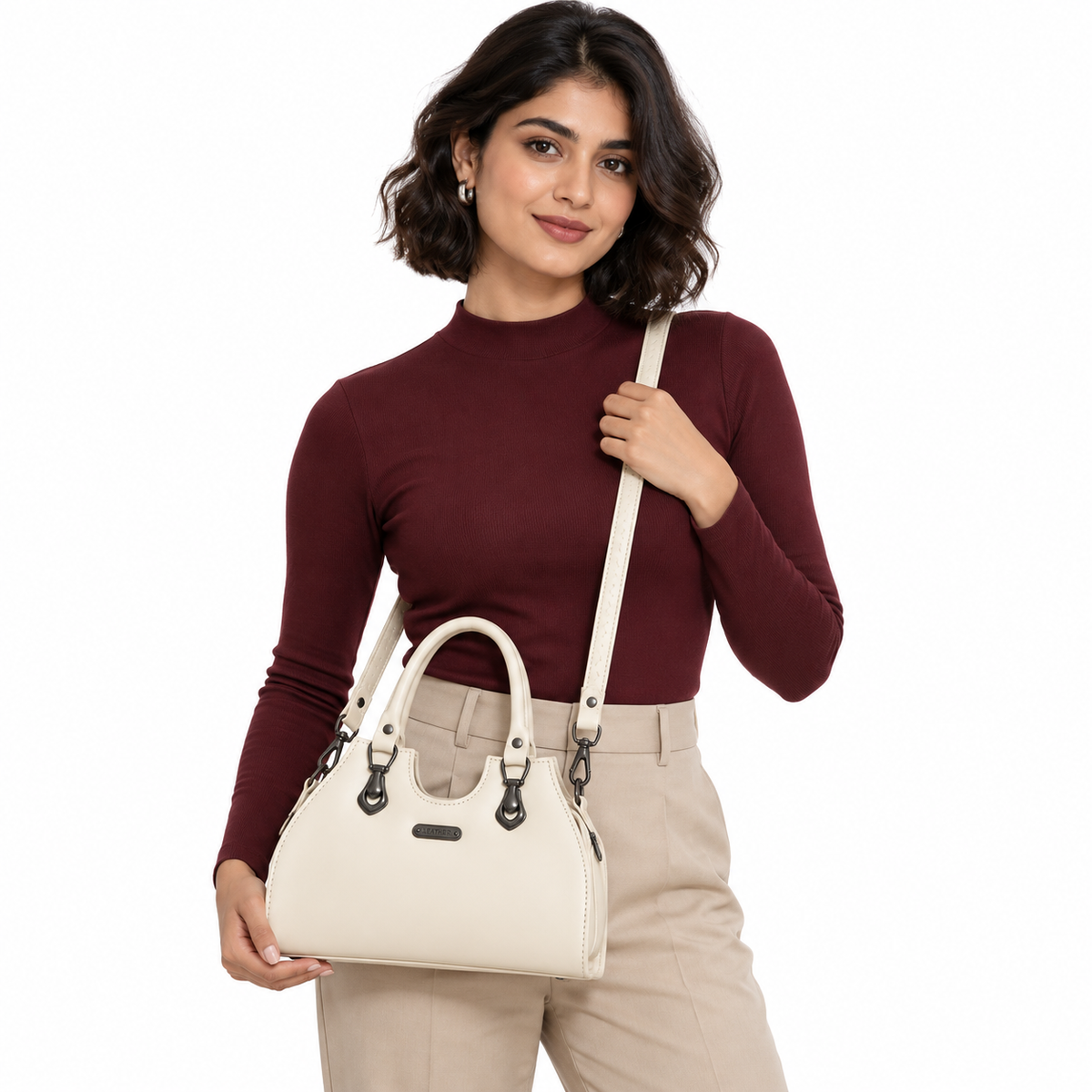 CELESTE — IVORY SCULPTED HANDBAG